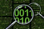 Magnifying glass over data.