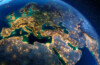 Planet Earth with the light of cities illuminating Europe and the Middle East.