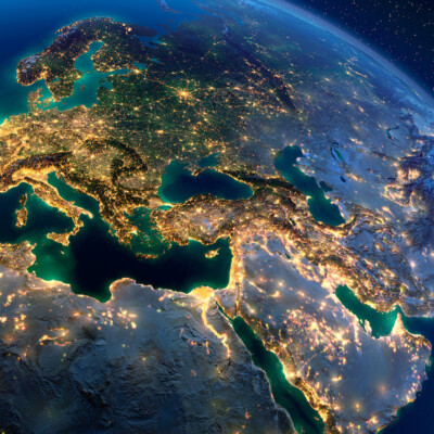 Planet Earth with the light of cities illuminating Europe and the Middle East.