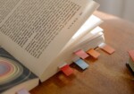 a hardcopy book with bookmarks in it