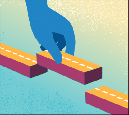 A hand holding a segment of roadway as if inserting it to connect two other portions of a road.