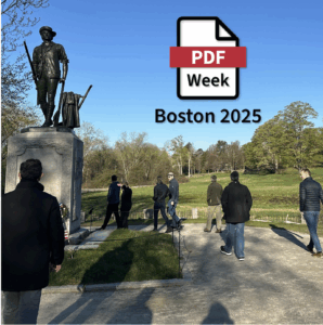 PDF Week attendees walk by a monument in Concord.