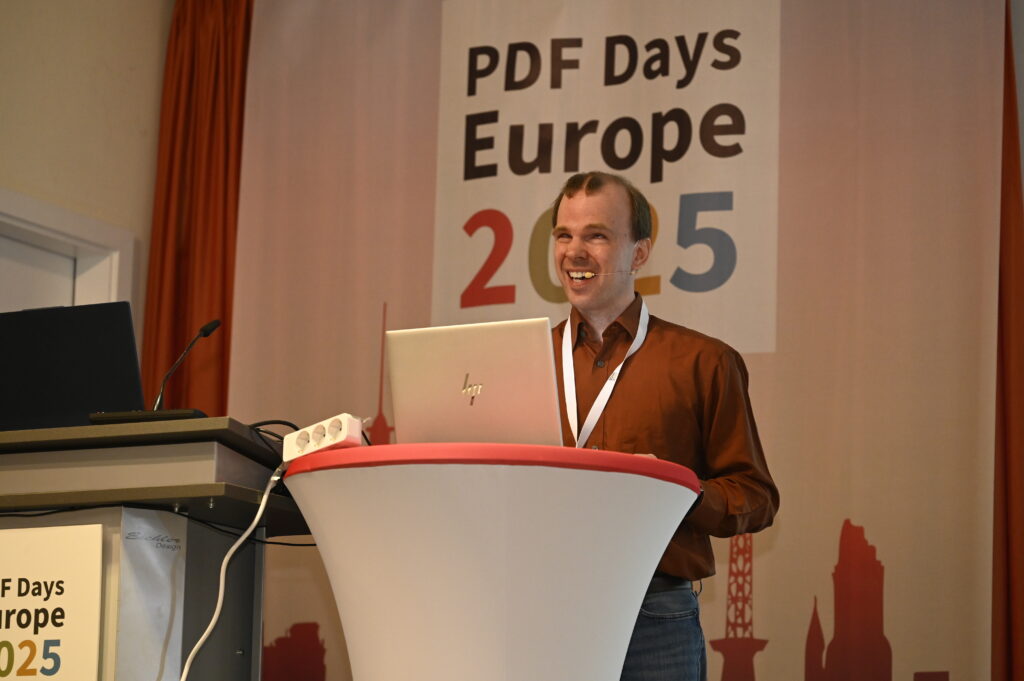 Alexander Pfingstl on stage at PDF Days Europe 2025
