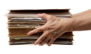 hands holding files